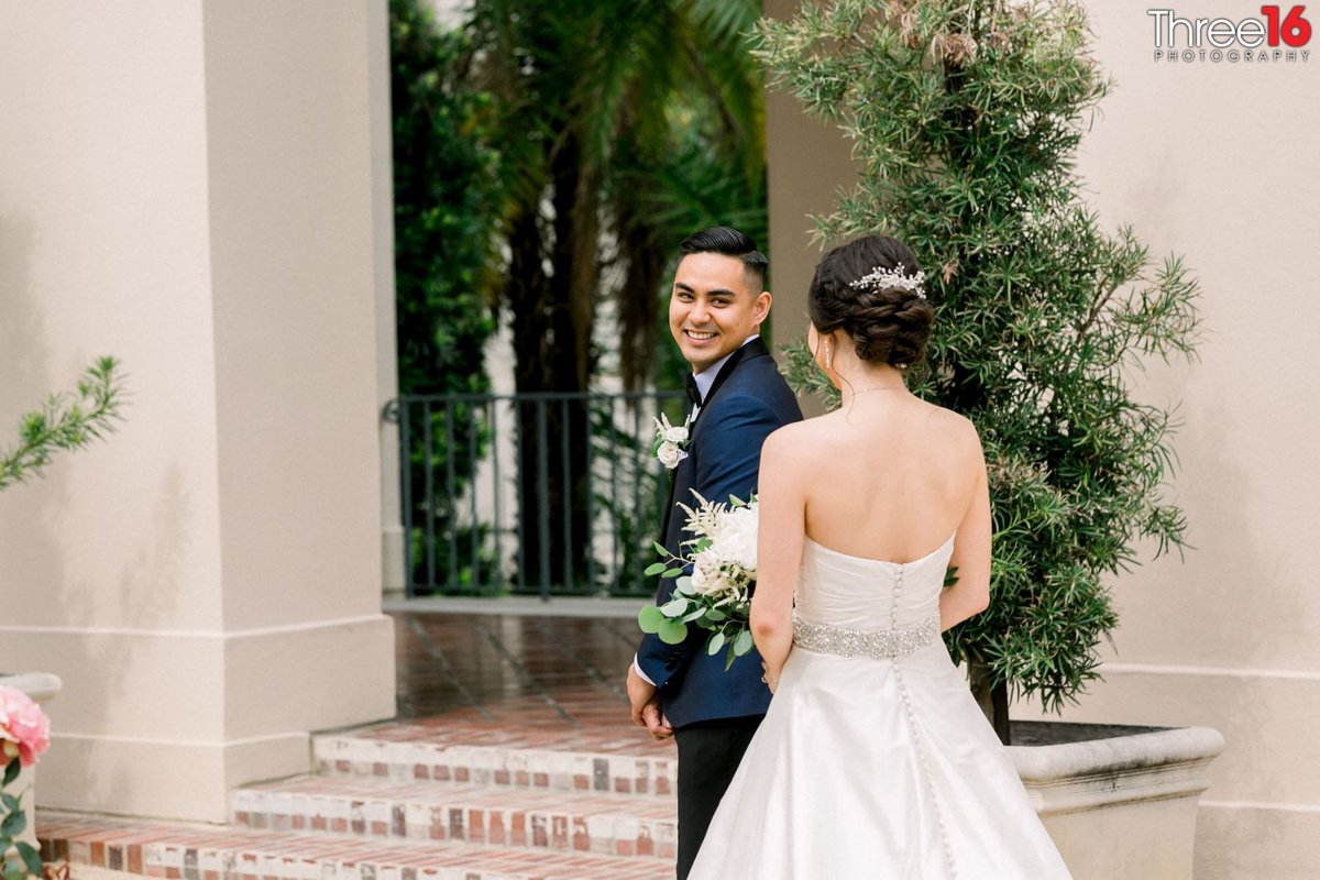 Groom turns to see his Bride in her gown for the first time