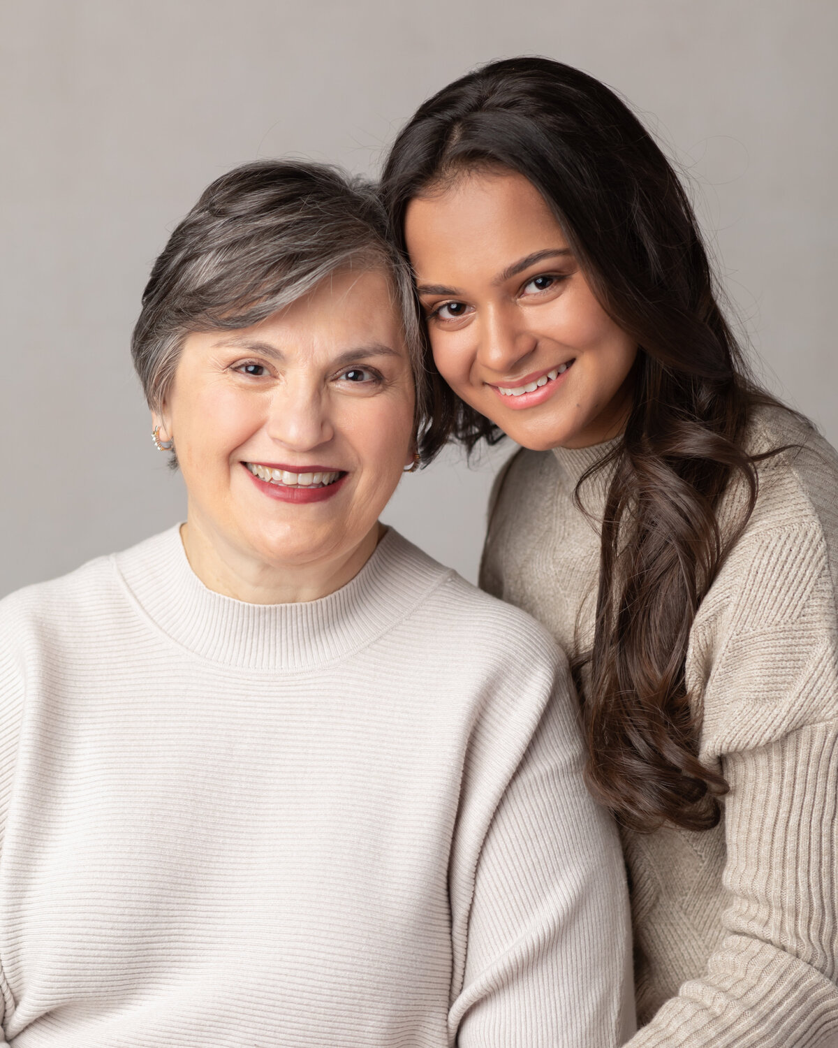portrait of a grandma and her granddaughter