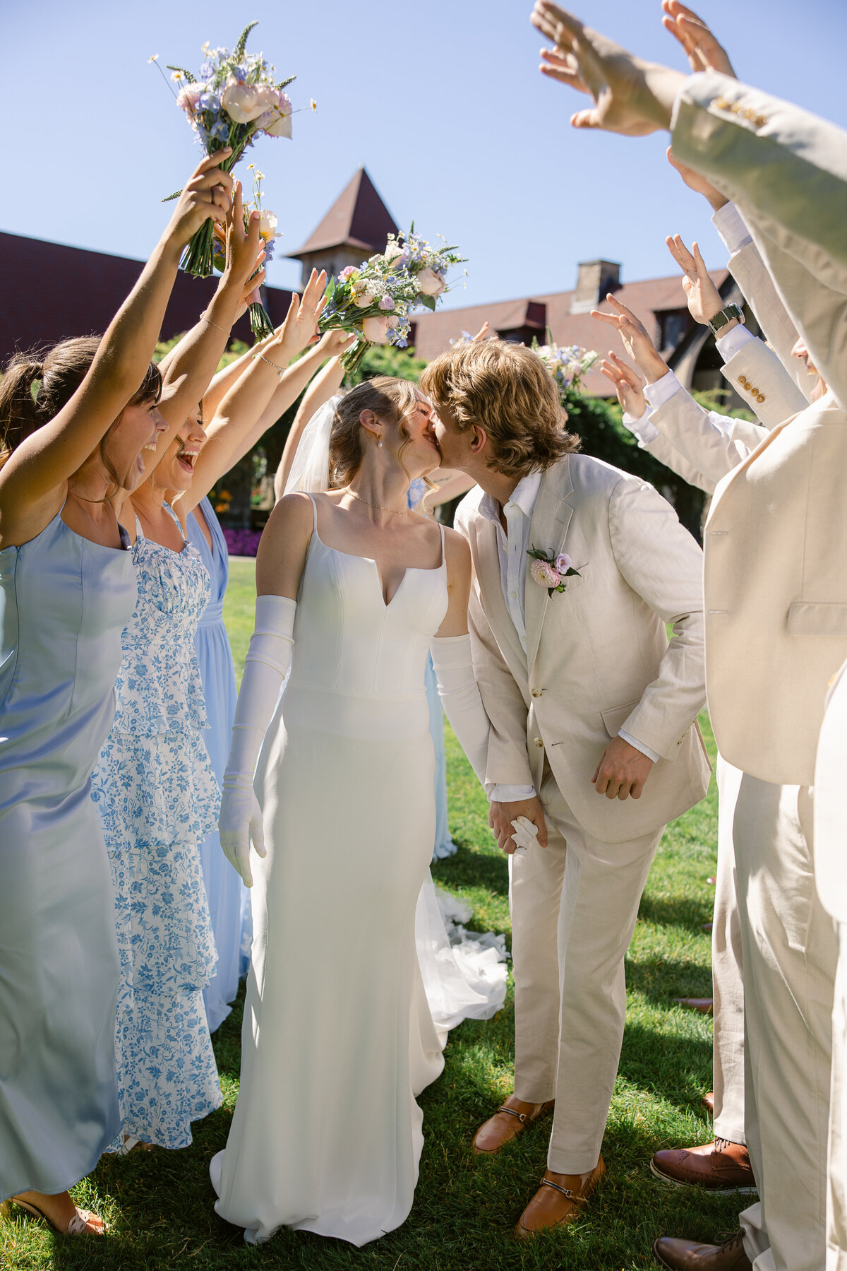 bride-and-groom-running-through-wedding-party-tunnel-connecticut-wedding