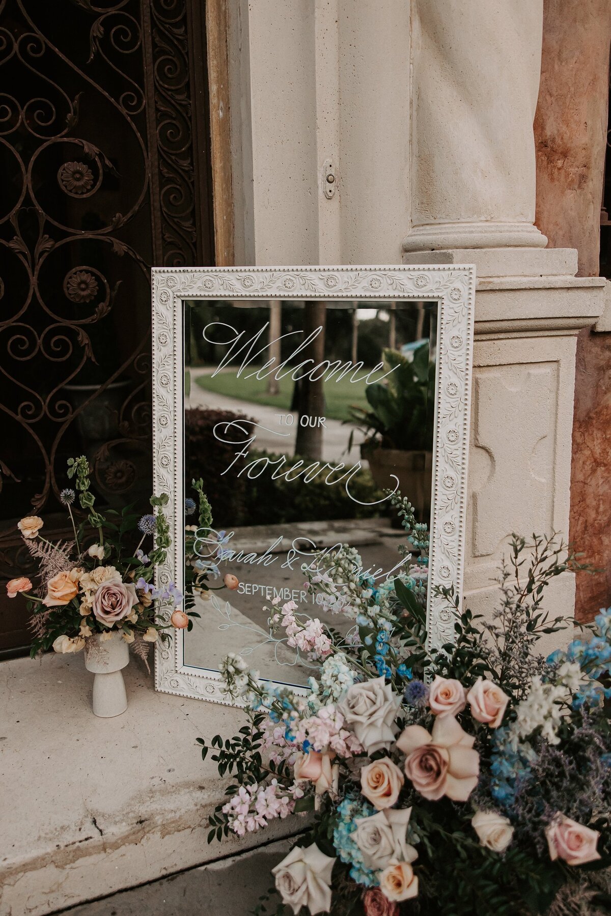 Large white vintage mirror with calligraphy for welcome sign