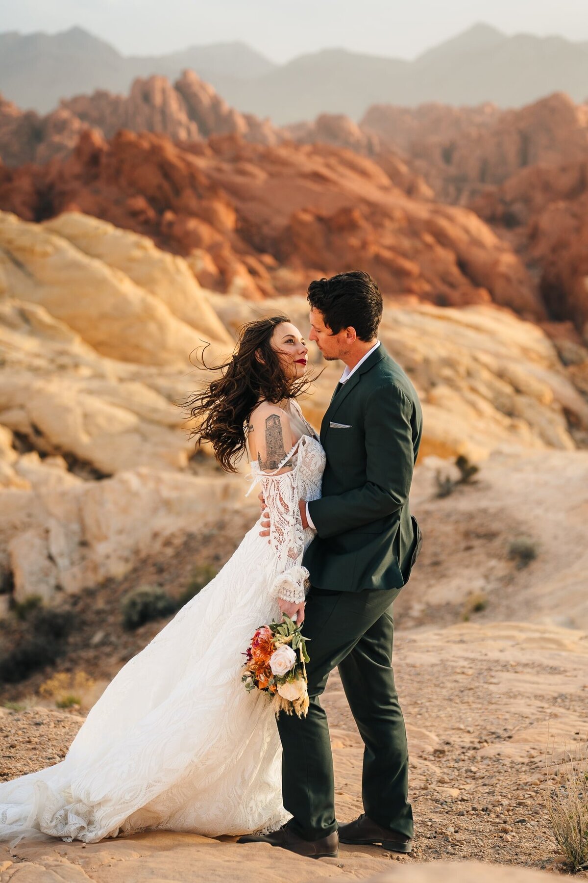 A couple staring at each other while taking photos during their elopement in Las Vegas.