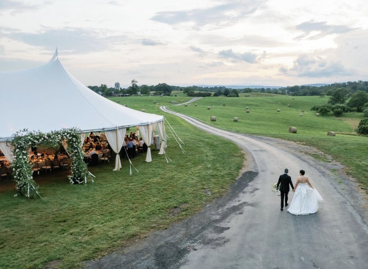Sailcloth tent with leg drapes