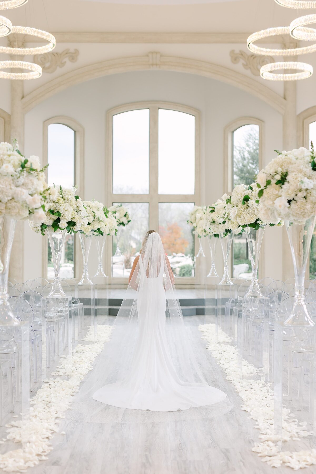 sophisticated wedding ceremony with bride walking down the aisle alone