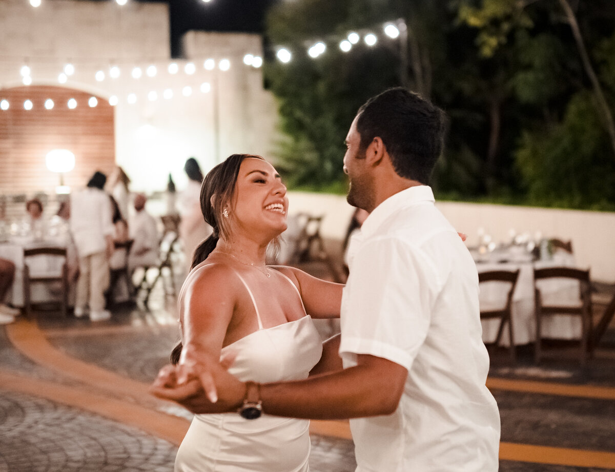 outdoor-wedding-rehearsal-dinner-dancing-couple-harry-mclaughlin-photography