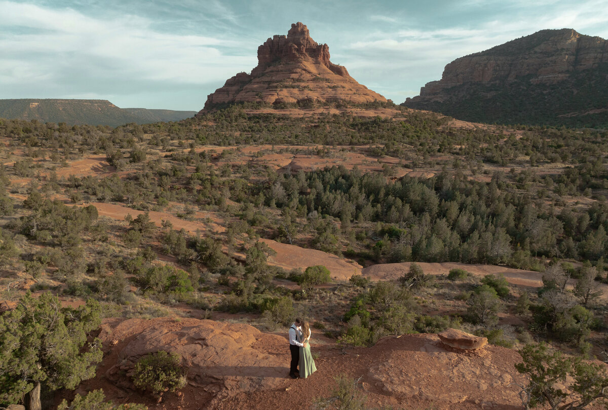 Sunset engagement photo in Sedona with golden Arizona light
