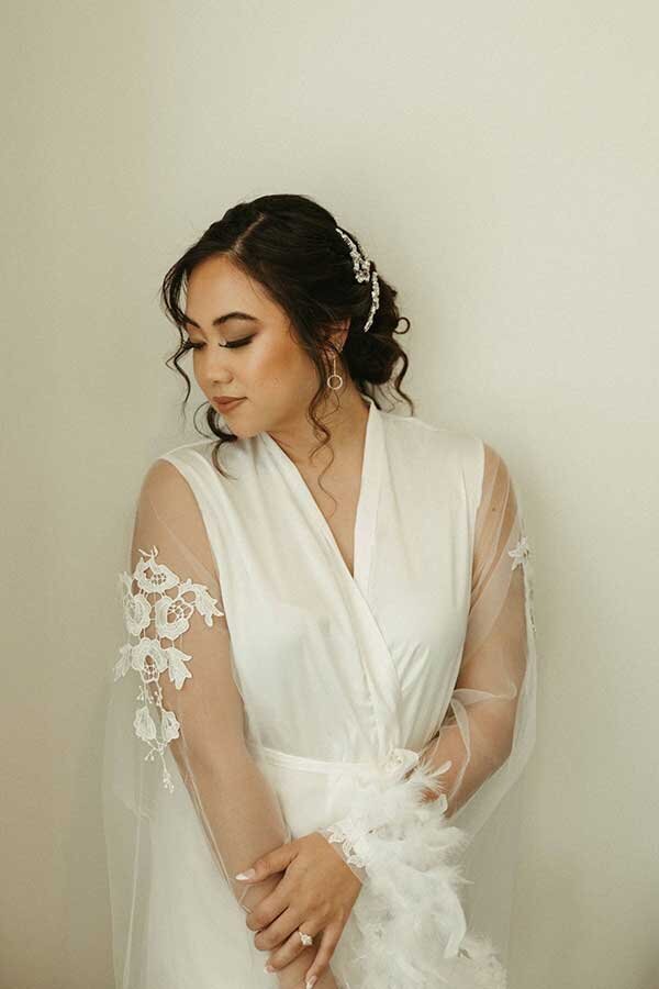 Asian bride getting wedding makeup artist services Jacksonville FL