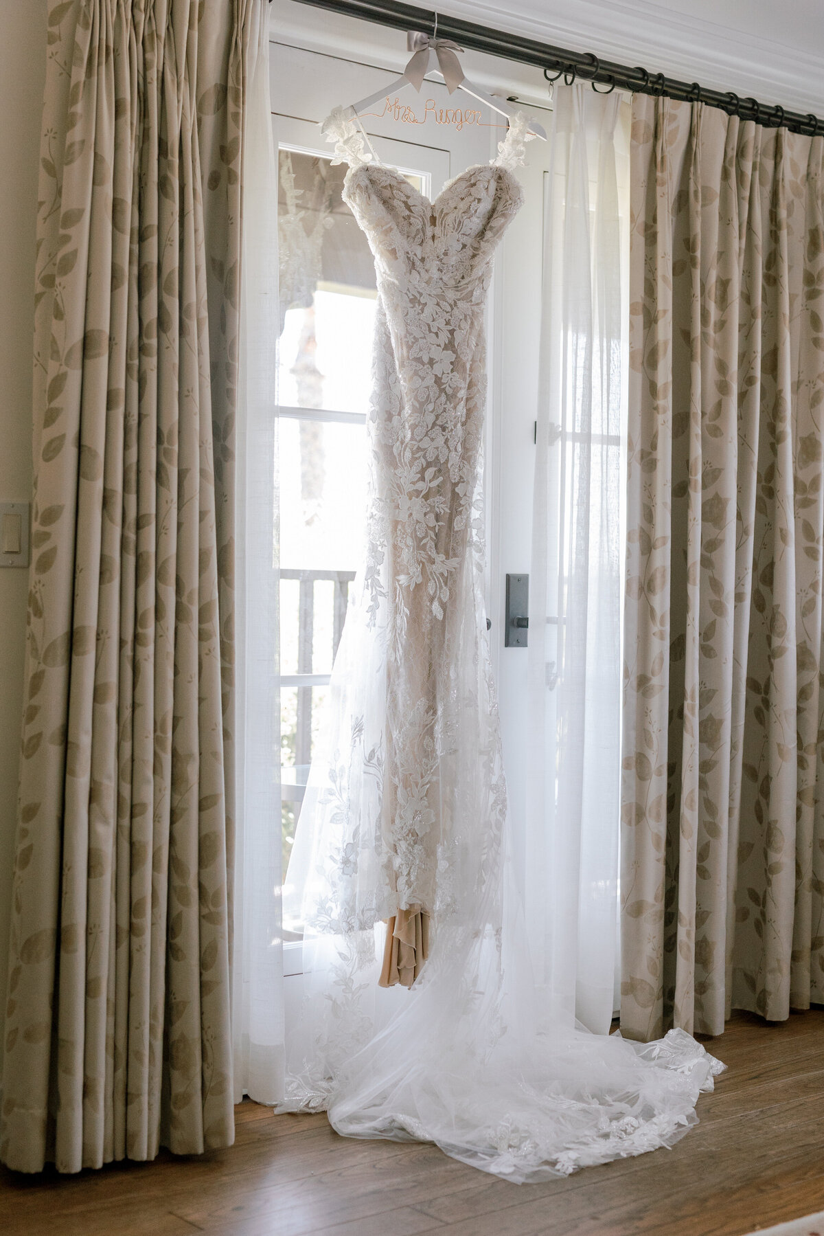 Wedding dress hang on a window