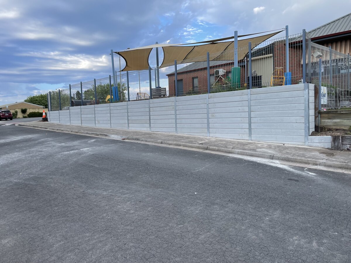 retaining wall with concrete sleeps