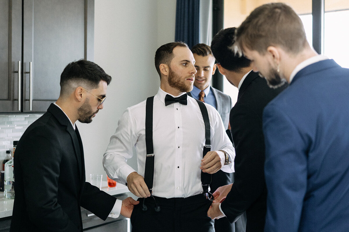 groomsmen getting ready at bella collina weddings & events​
