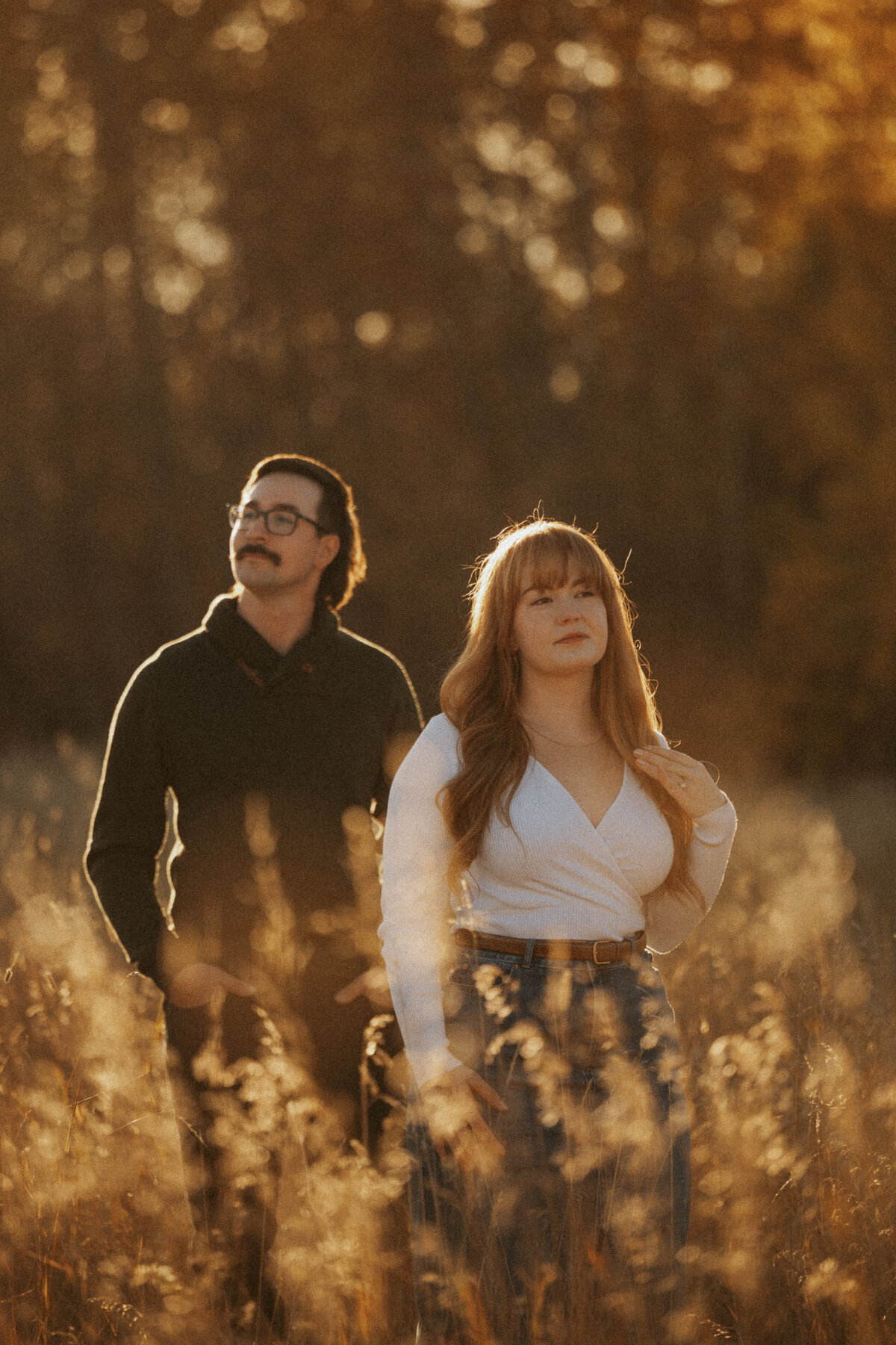 Fall photograph of Edmonton couple in a field