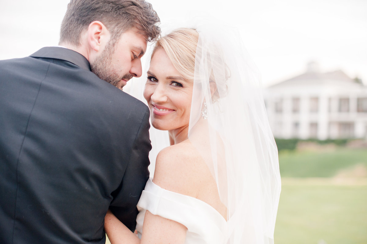 Bride and groom at Washington Golf and Country Club luxury Washington DC wedding