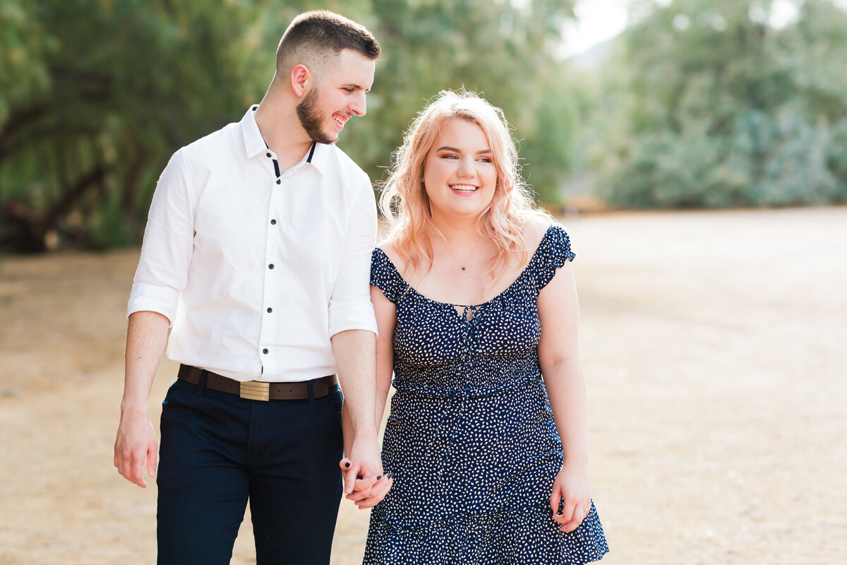 just married couple walking together in Cave Creek