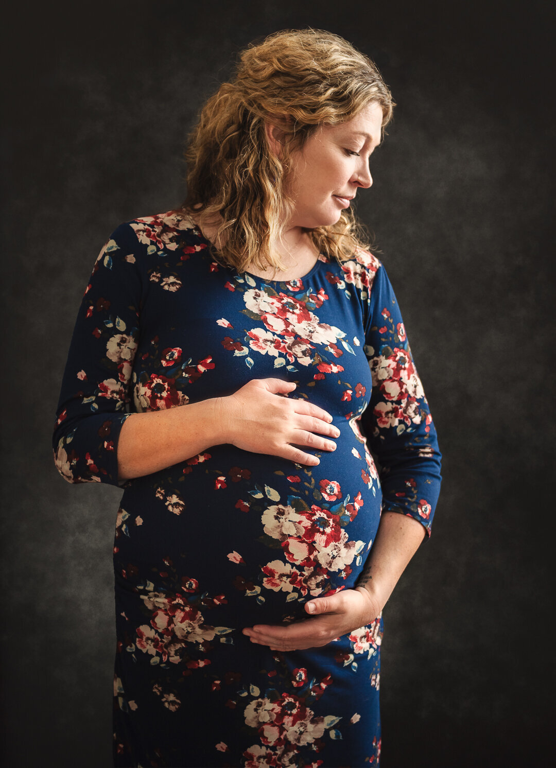 Expecting mother during a maternity photography session in New Richmond Wisconsin