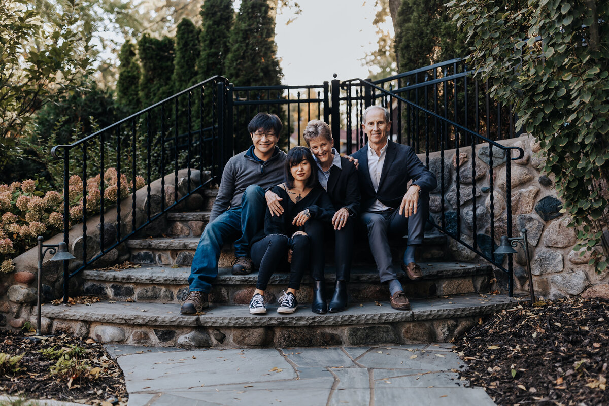 Nashville family photographers capture family sitting on steps