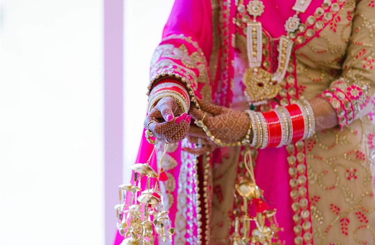 Bride adorned with stunning Mehendi ceremony makeup, a highlight of Ludhiana destination wedding