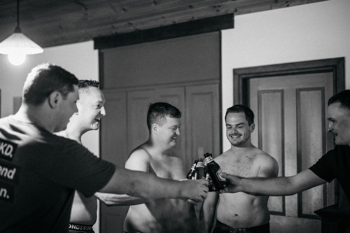 Ben together with his groomsmen having a drink before the wedding ceremony