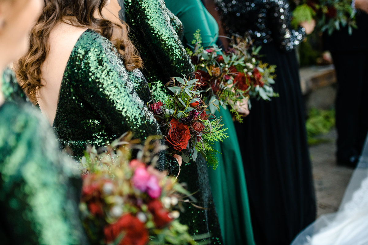 Lake Tahoe Wedding Planners maids in emerald green sequin dresses, winter wedding at venue The Resort at Squaw Creek, Lake Tahoe, Joy of Life Events image by Charleston Churchill