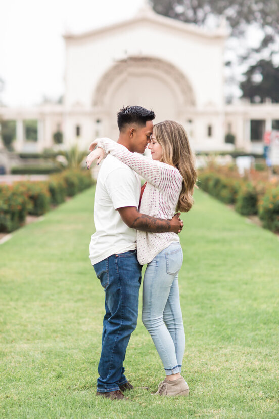engaged couple in front of organ pavilion balboa park