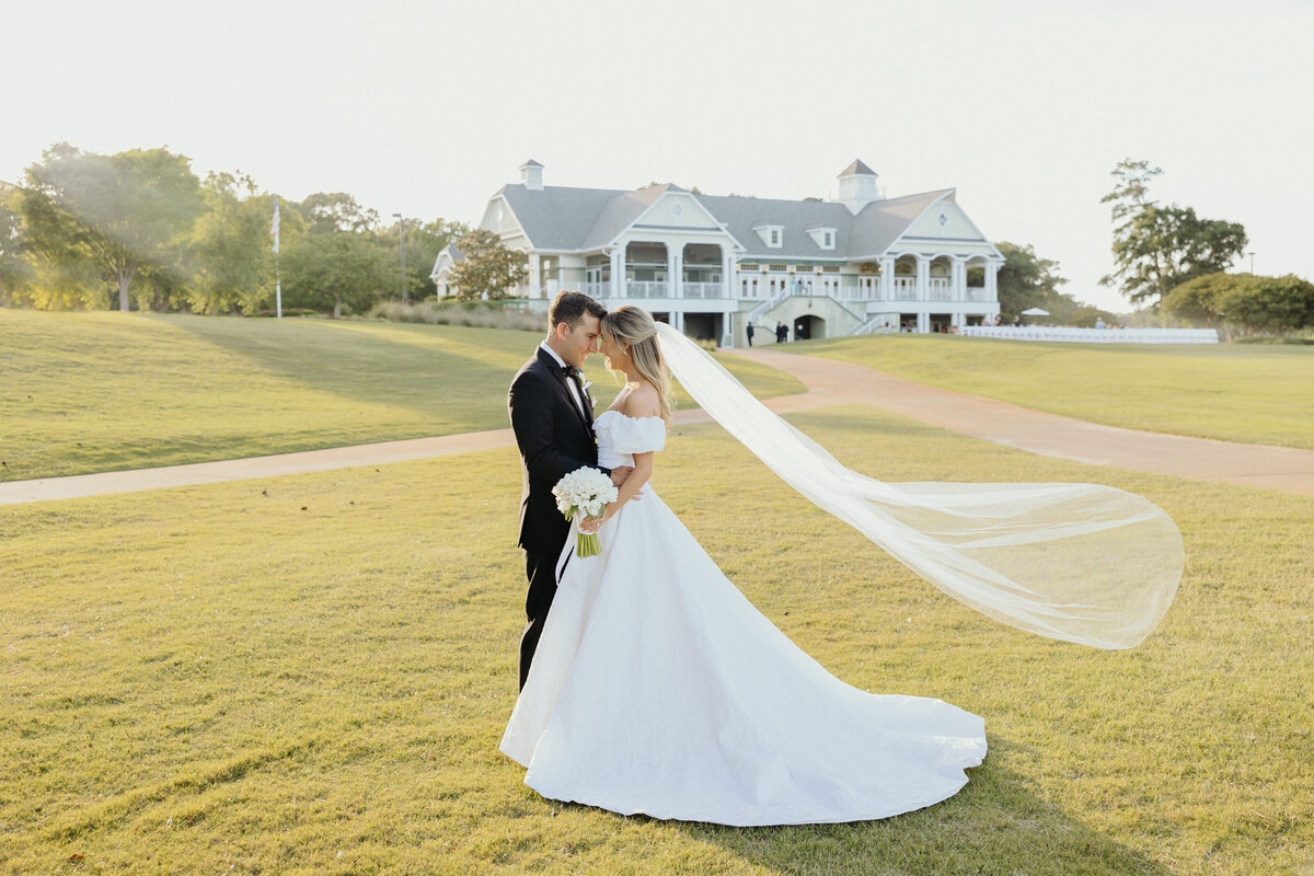 Wedding Couple in front of Duck Woods Country Club