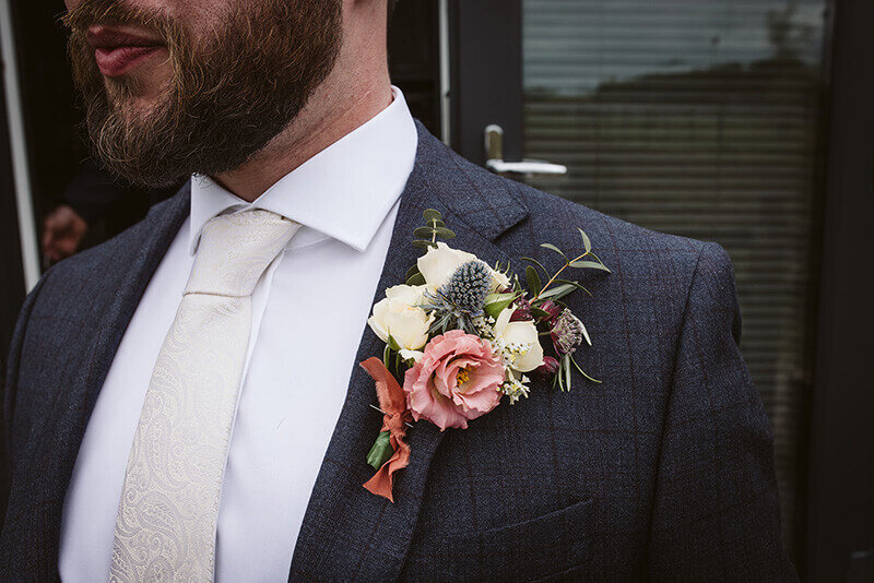 Grooms button hole flowers