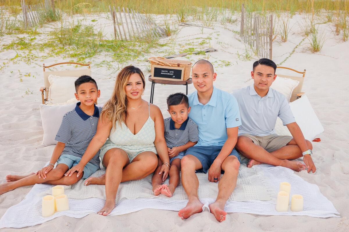 Anniversary surprise picnic for couple on vacation provided by Beachside Blankets