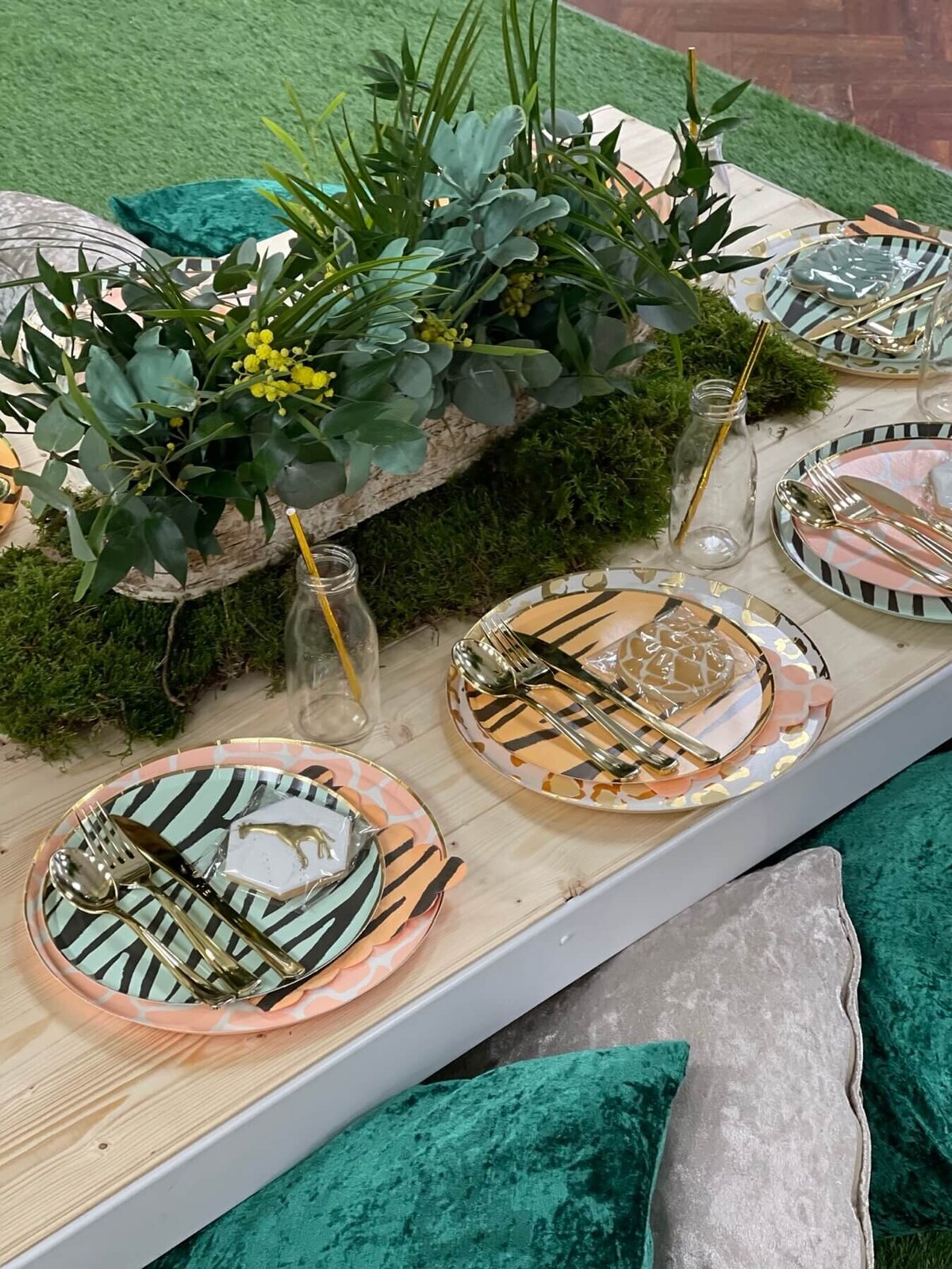 Kids party table setting with bespoke biscuit favours