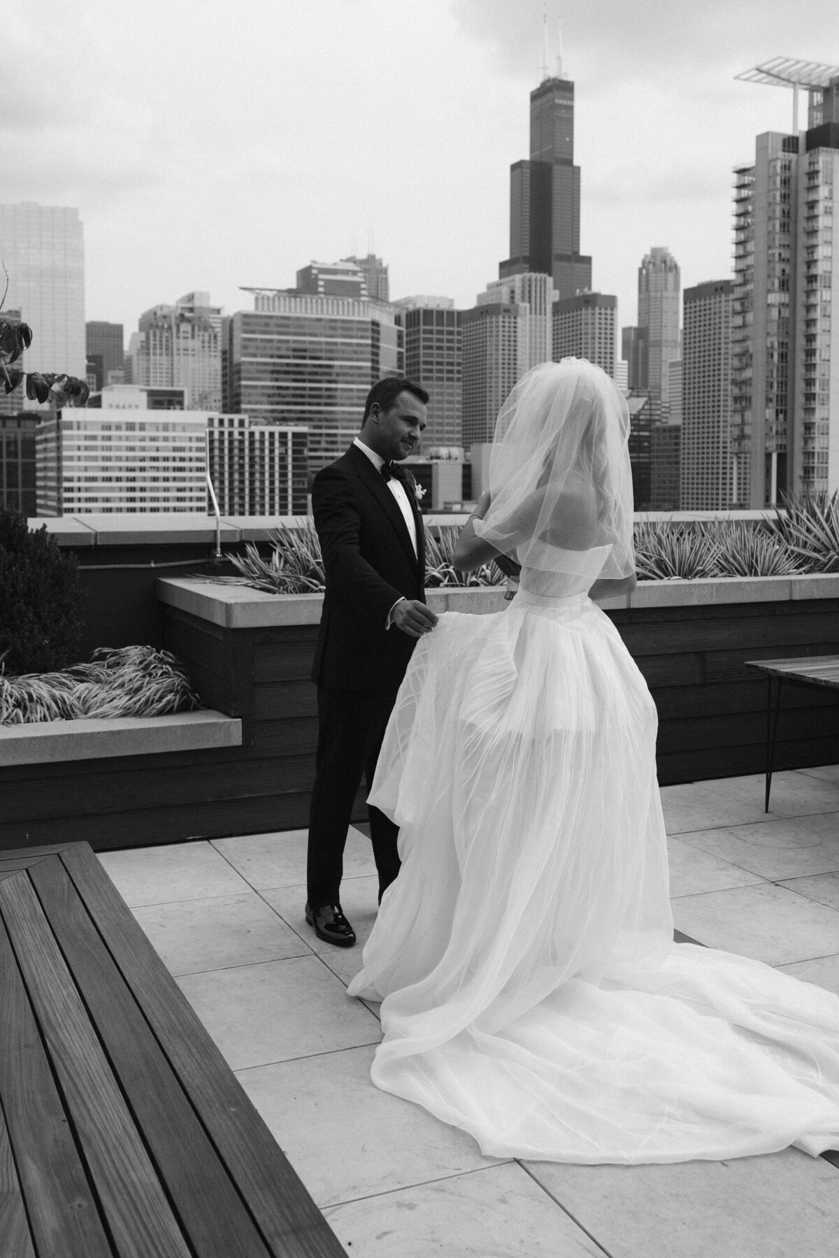 Sophisticated editorial wedding photography at NOBU Hotel Chicago featuring Lauren Alatriste's fashion forward approach to luxury wedding preparation, creating magazine-worthy imagery that balances editorial excellence with authentic emotion.
