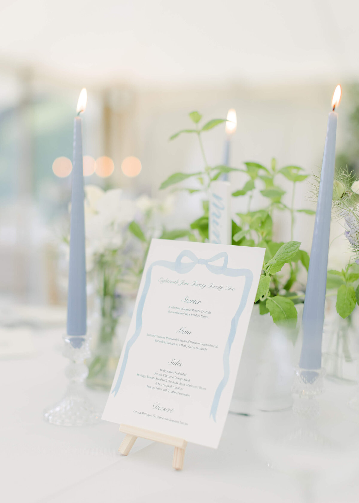 chloe-winstanley-weddings-wiltshire-hatch-house-menu-blue-candlesticks