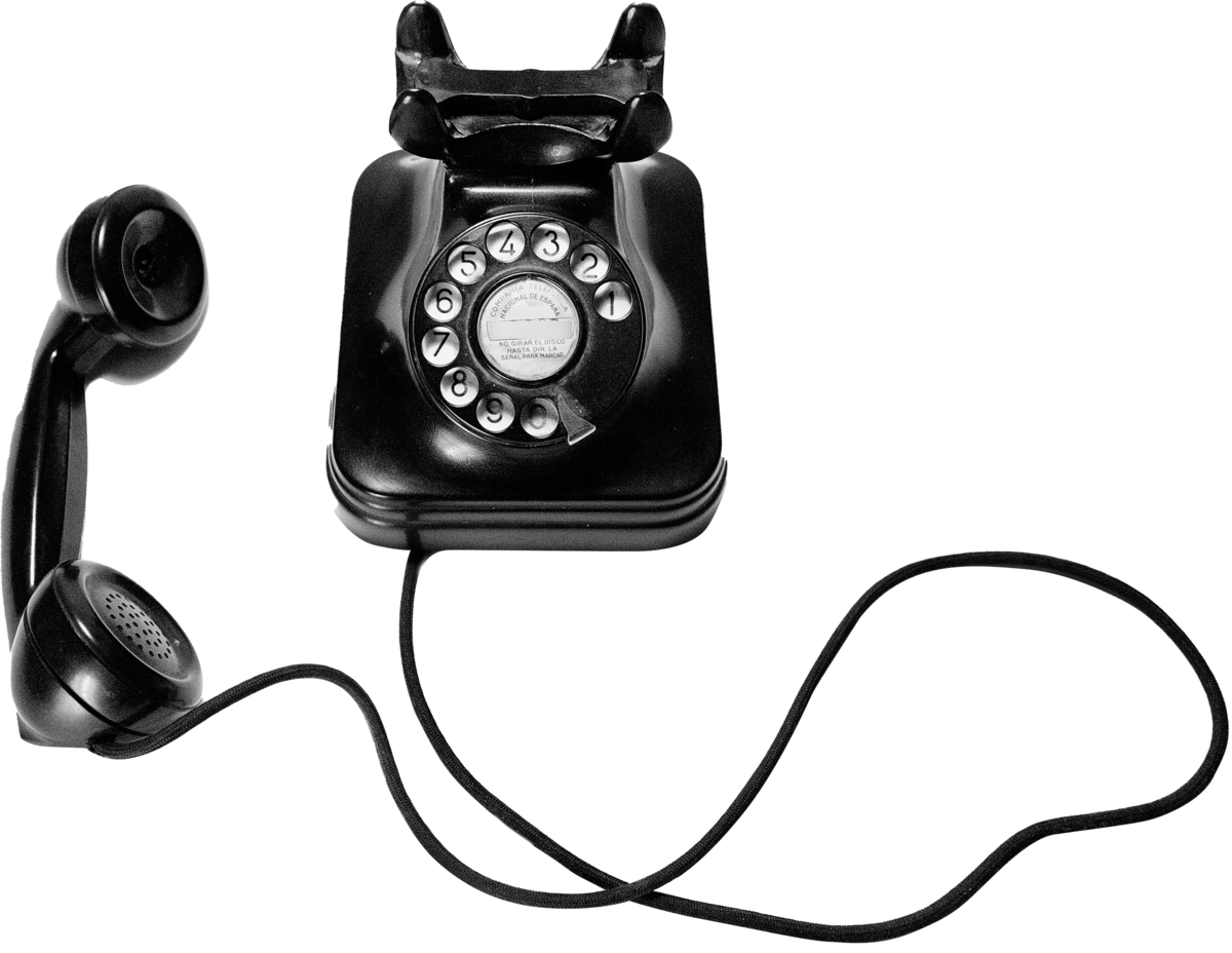 vintage telephone with a corded phone off the hook