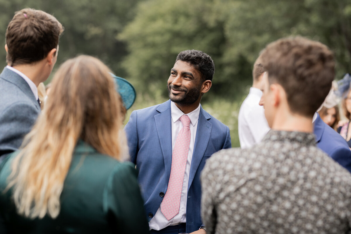 Candid guests portraits at Devon marquee wedding