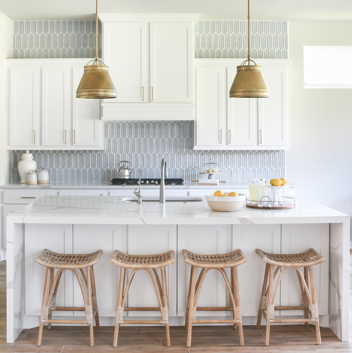 sleek-white-kitchen-waterfall-counter-interior-design-georgetown-texas-2-min