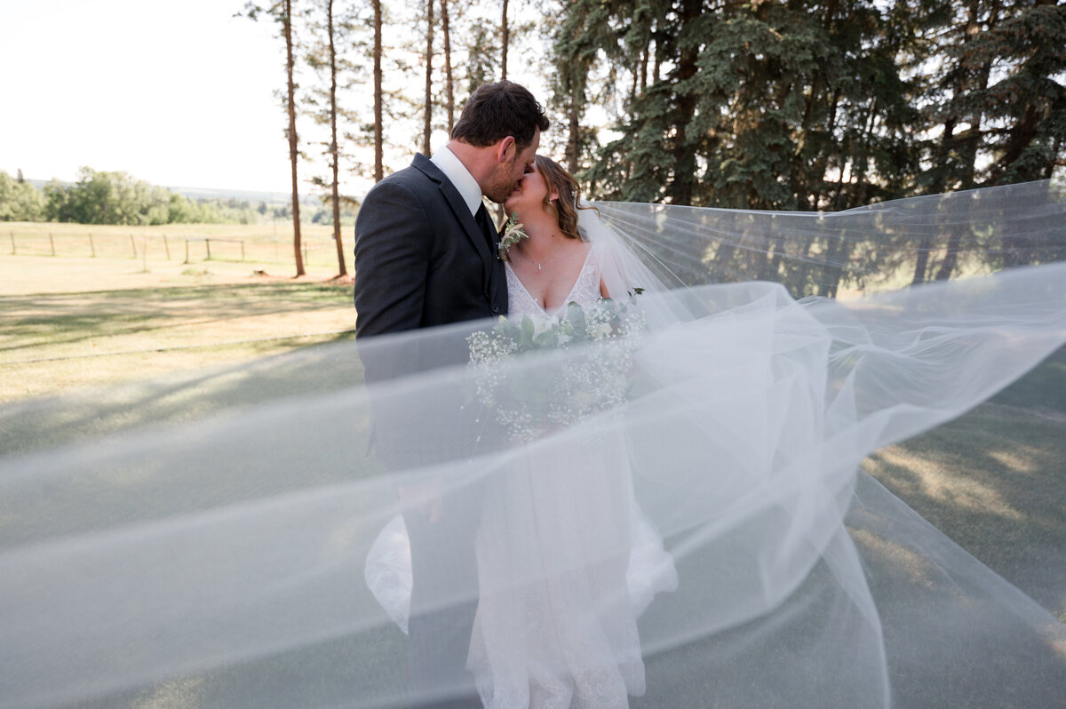 bride and groom kiss