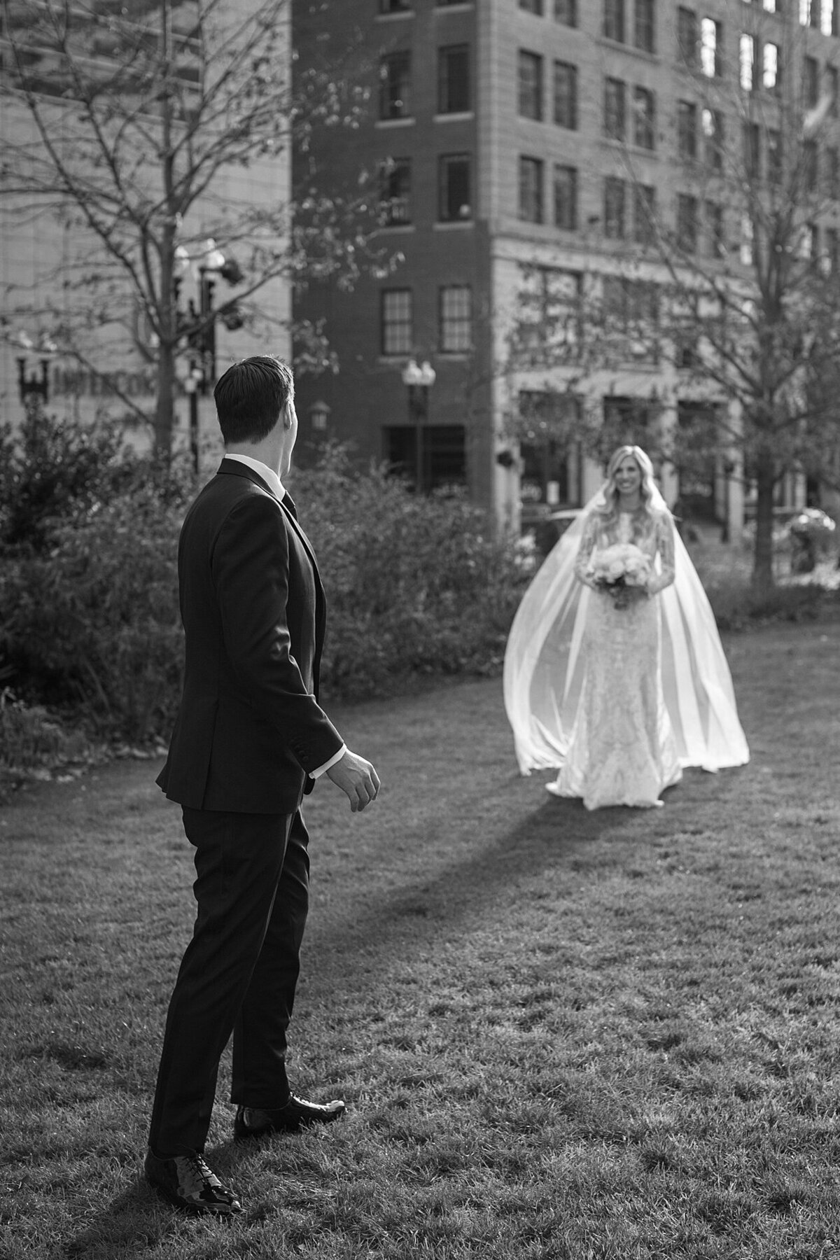 Groom  turns to see his Bride for their First Look. Deborah Zoe Photography.