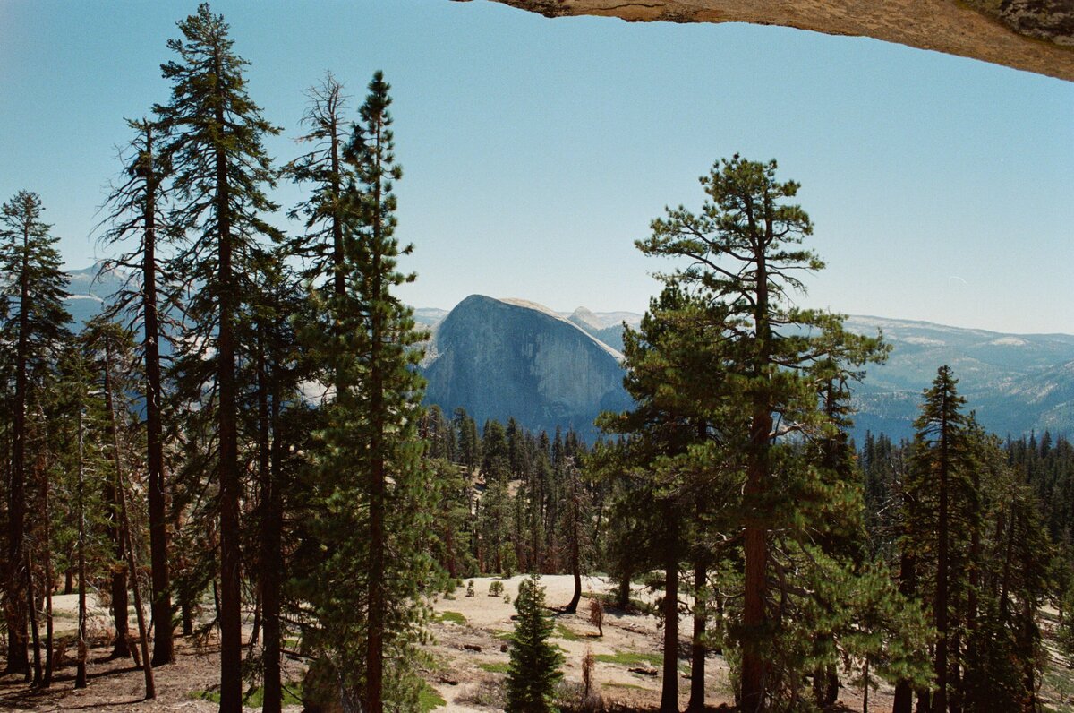 Half Dome captured on film by Kate Winters Photography, showcasing the iconic beauty and majestic landscape of Yosemite in an authentic, documentary style.