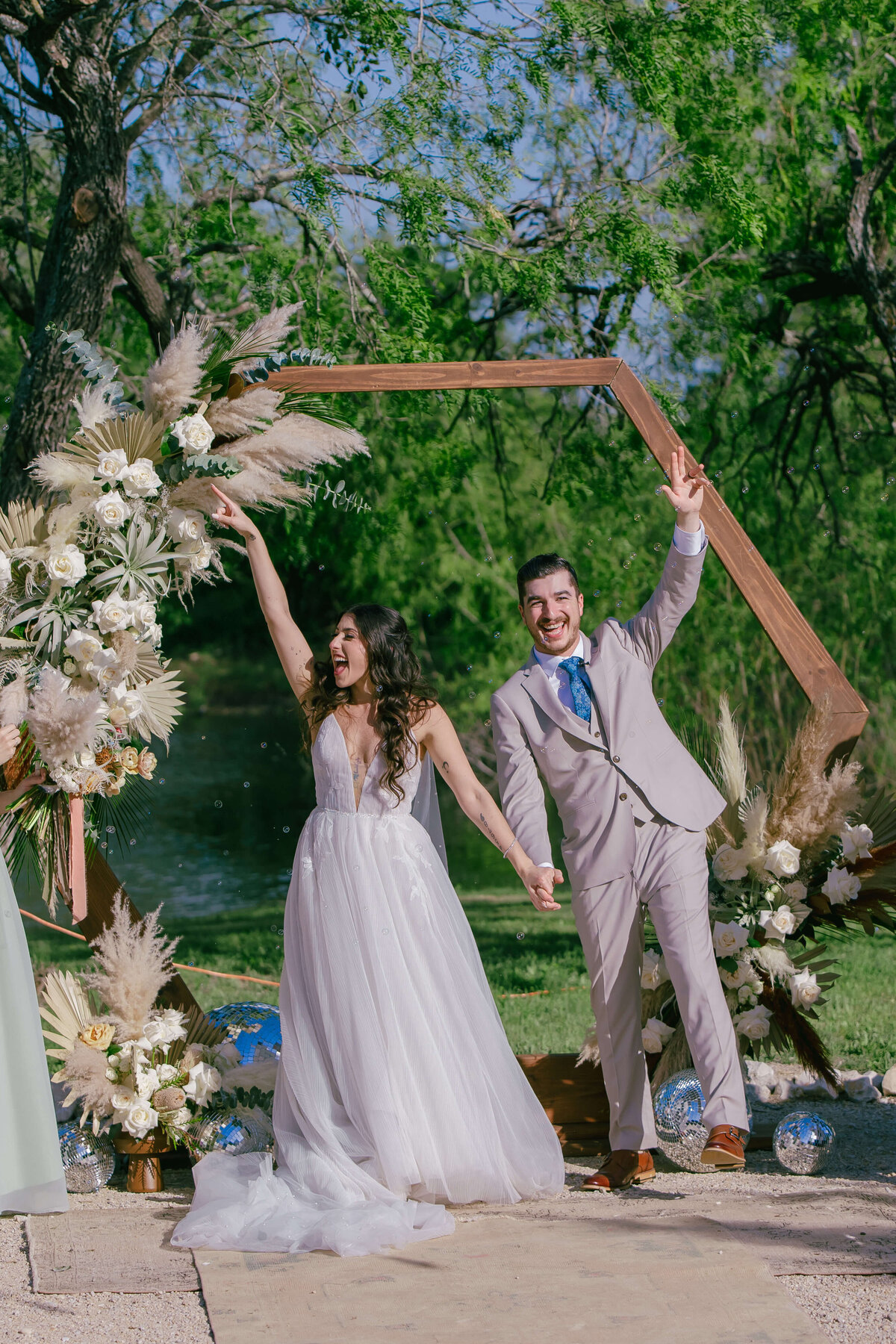 Celebrate your big moment with Mistique Makeup’s expert wedding hair and makeup services. This bride shines with soft curls and glowing makeup styled by our mobile bridal hair and makeup team. Book our wedding mobile hair and makeup artists for on-site beauty across San Antonio, Austin, and Dallas.