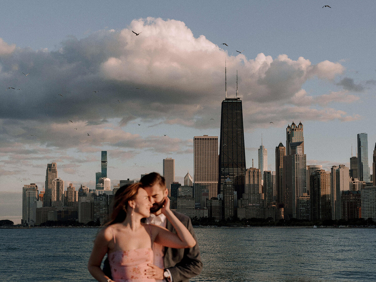 Bride and groom walking on the beach during sunset at South Shore Cultural Center in Chicago, captured by Chicago wedding photographer Abe Fernandez in a candid, documentary style