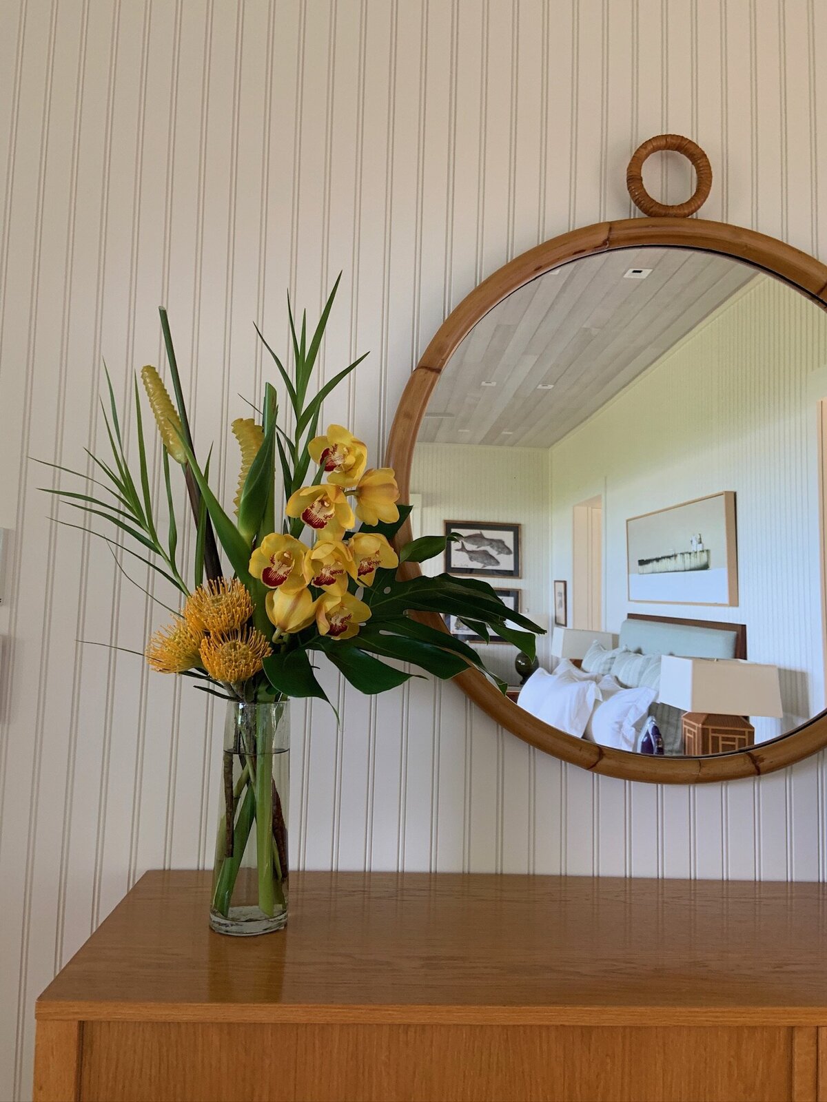 Yellow cymbidium orchid master bedroom arrangement