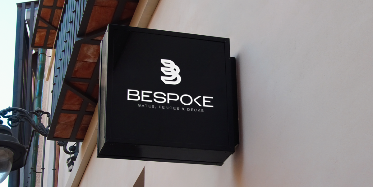 Bespoke Gates, Fences & Decks logo on sign