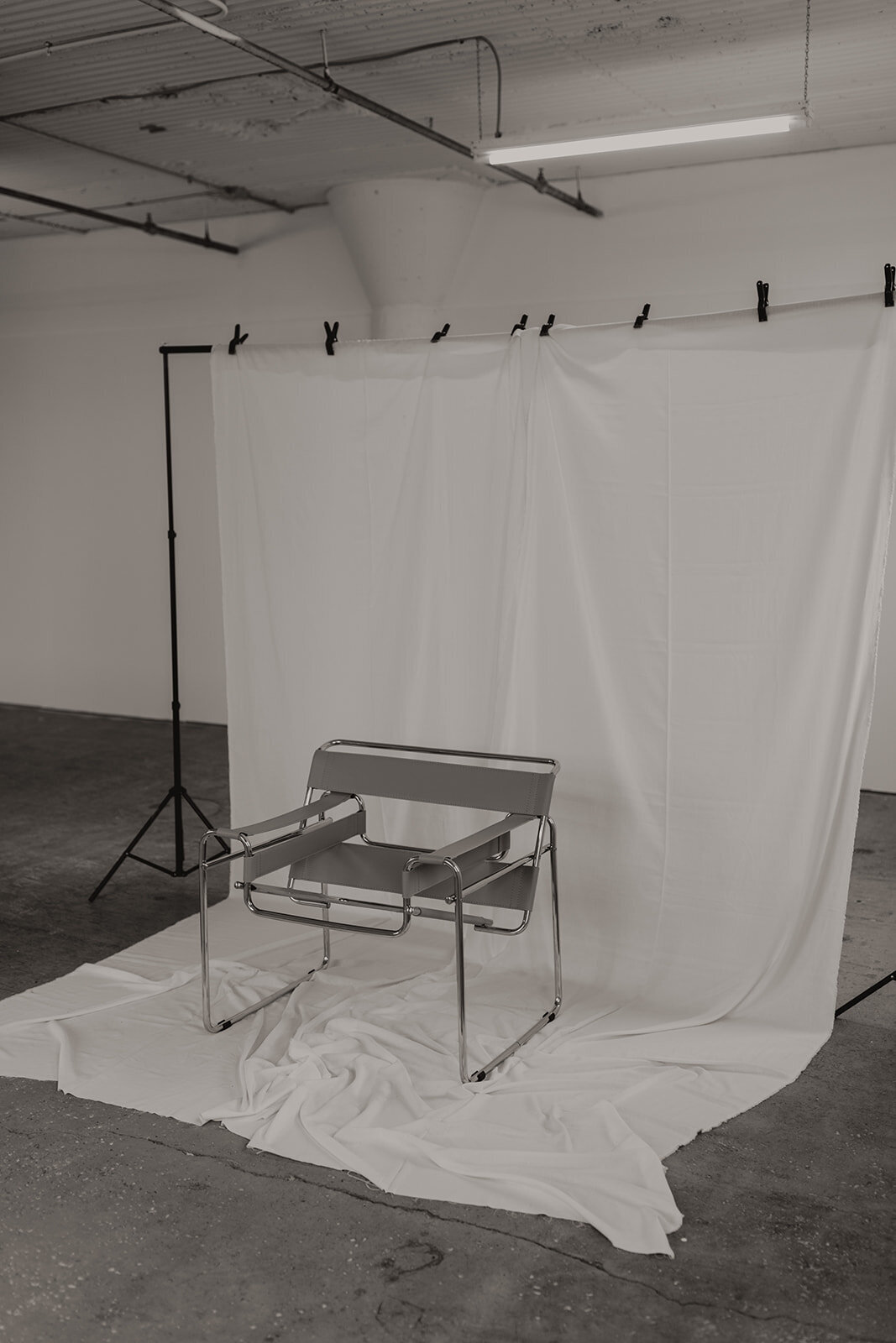 Wassily chair in front of white photo backdrop