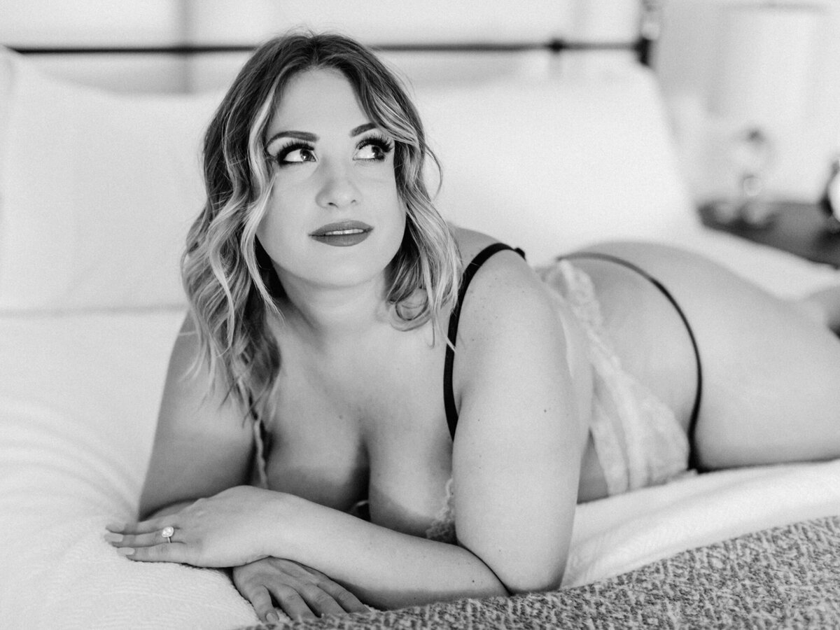 A sultry black and white boudoir photo