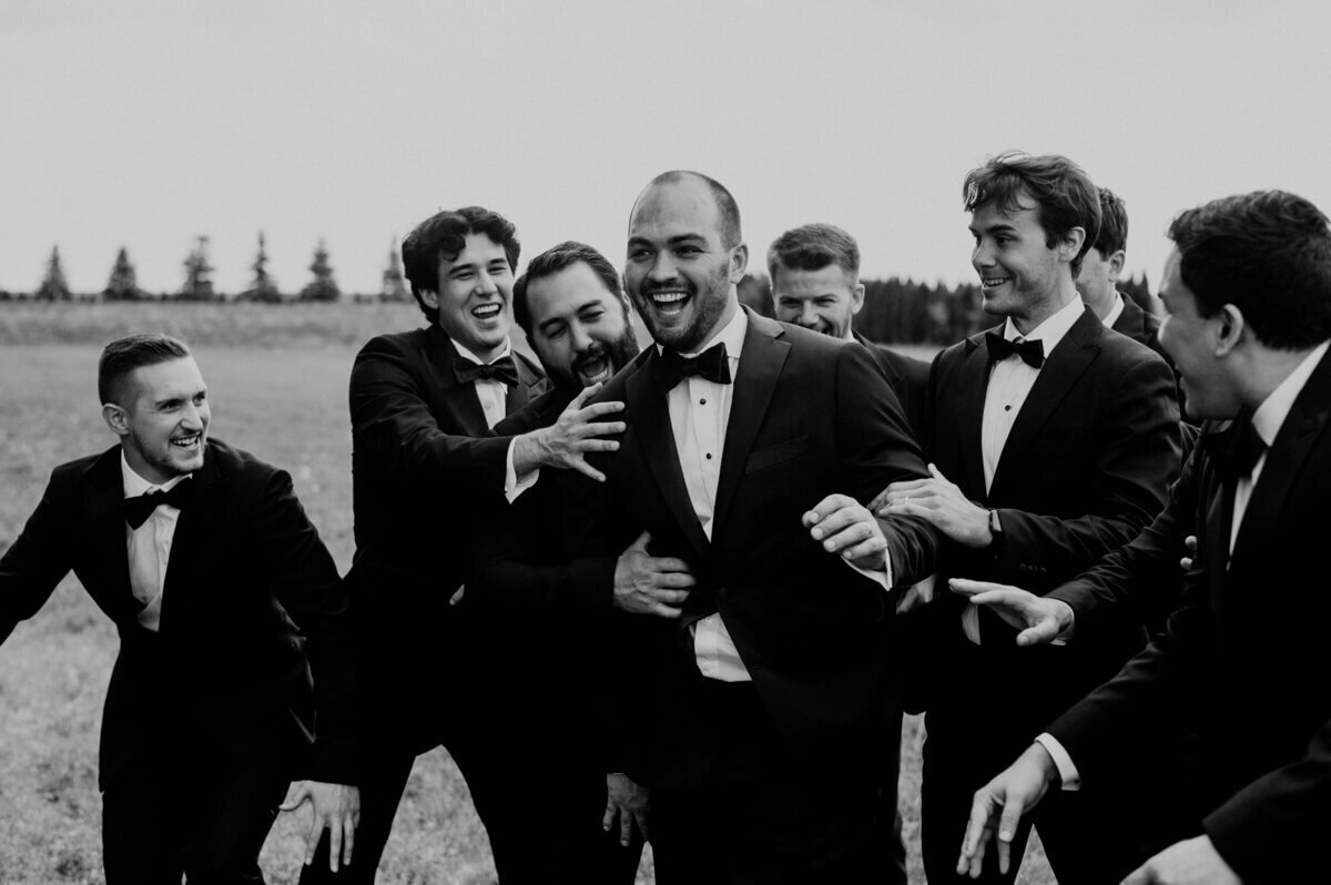 Groom with groomsmen at wedding by luxury wedding planner chicago