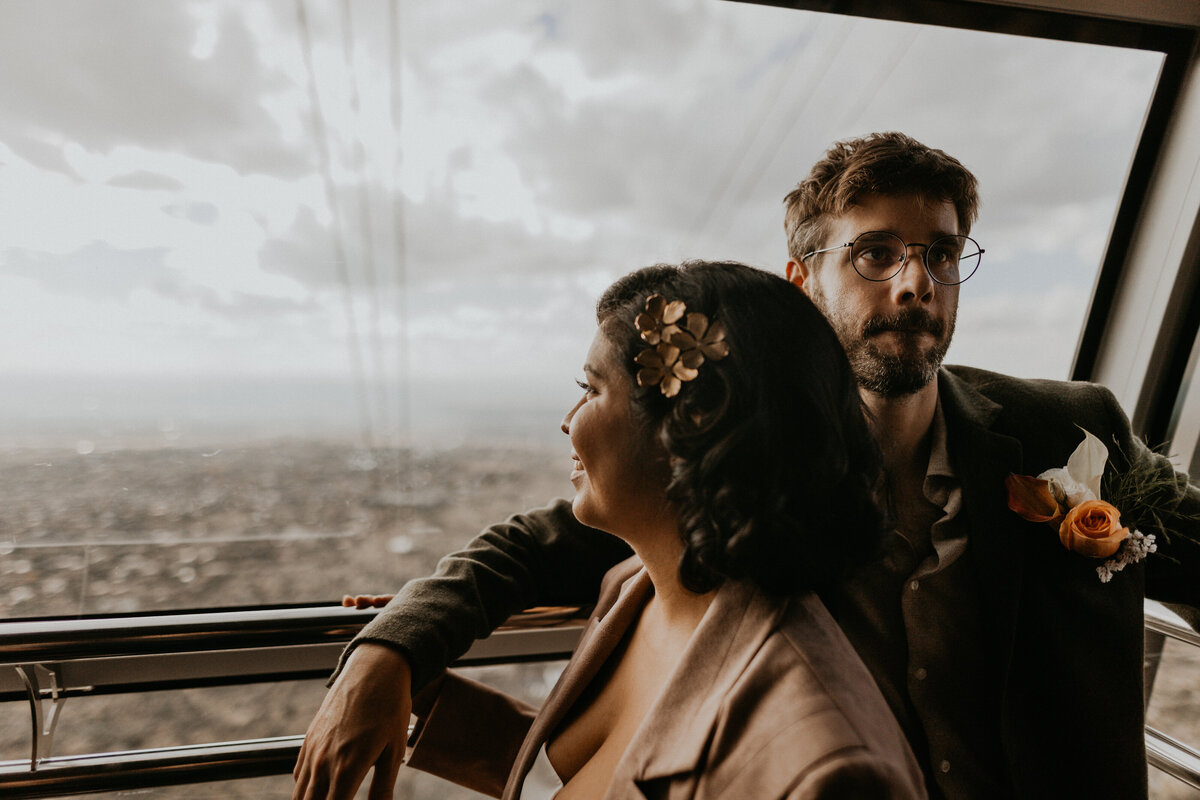 bride and groom taking a tram to the top of the Sandia Mountains in Albuquerque