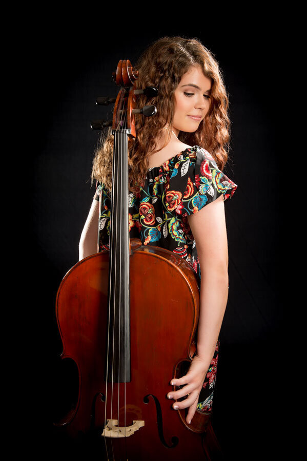 girl with cello in studio