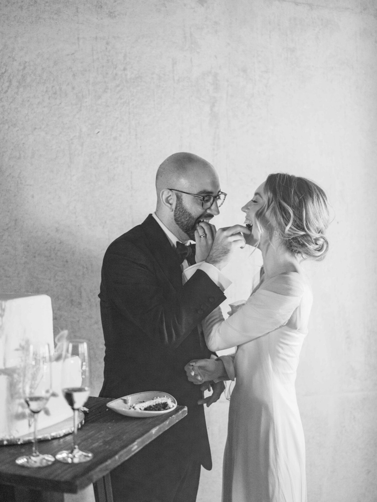 Amangiri Wedding Groom Feeding Cake to Bride