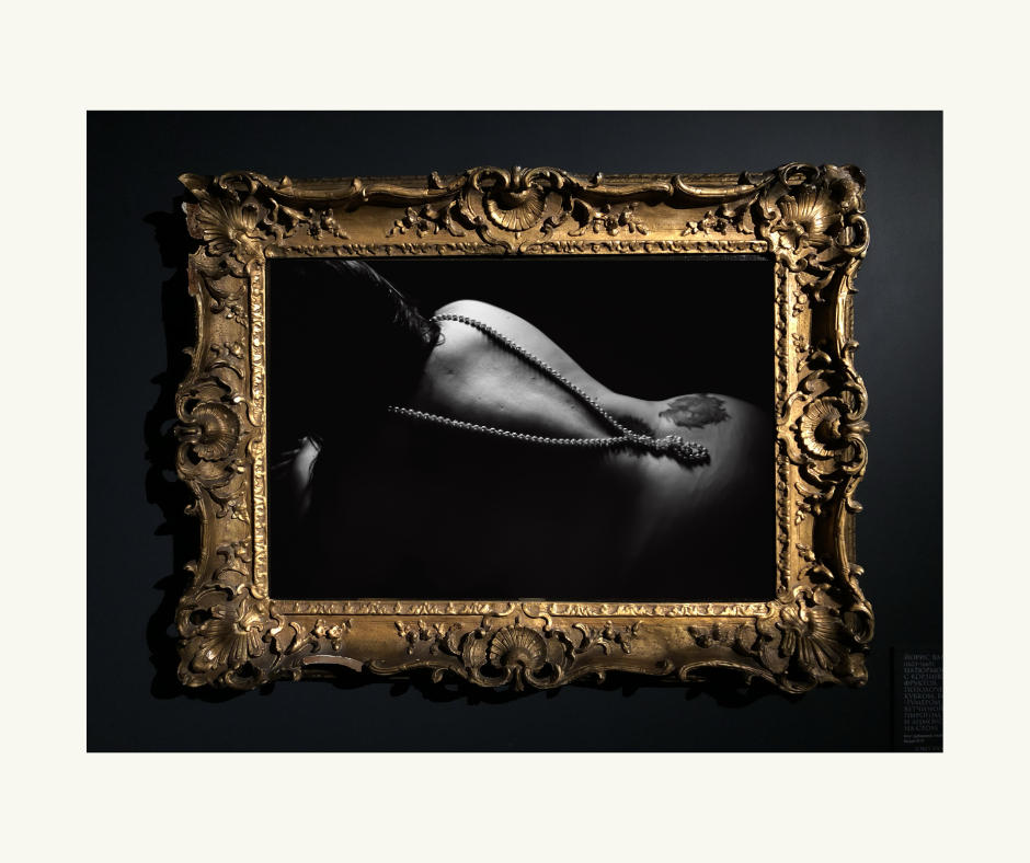 Ornate gold frame with a black and white boudoir image of a back in Minneapolis Mn