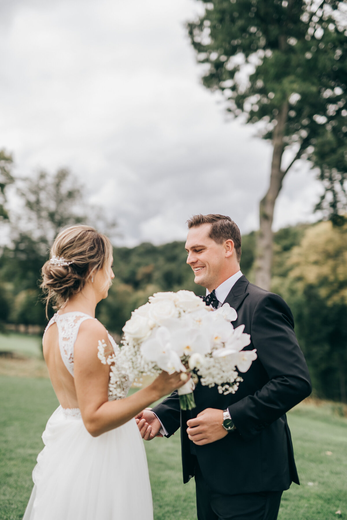 A groom's reaction to his bride during their romantic first look