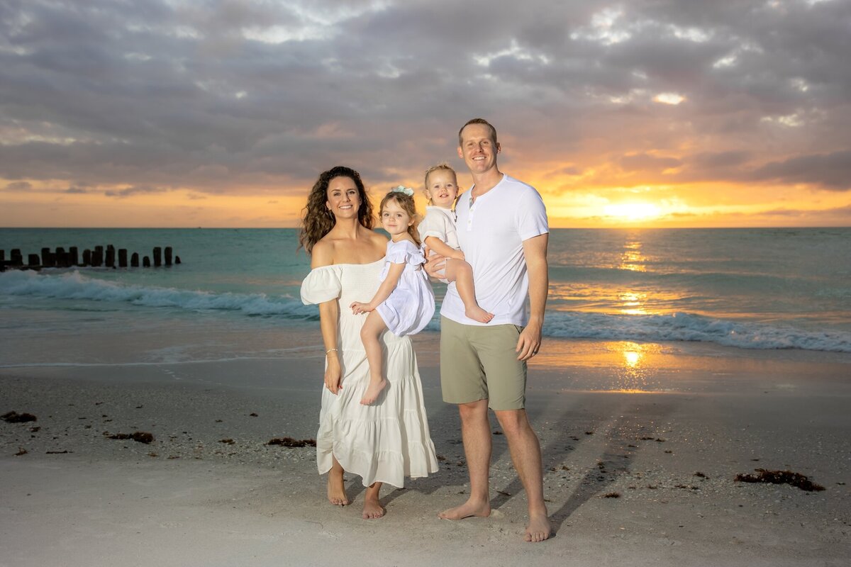 Family Photo taken on the beach of Anna Maria Island