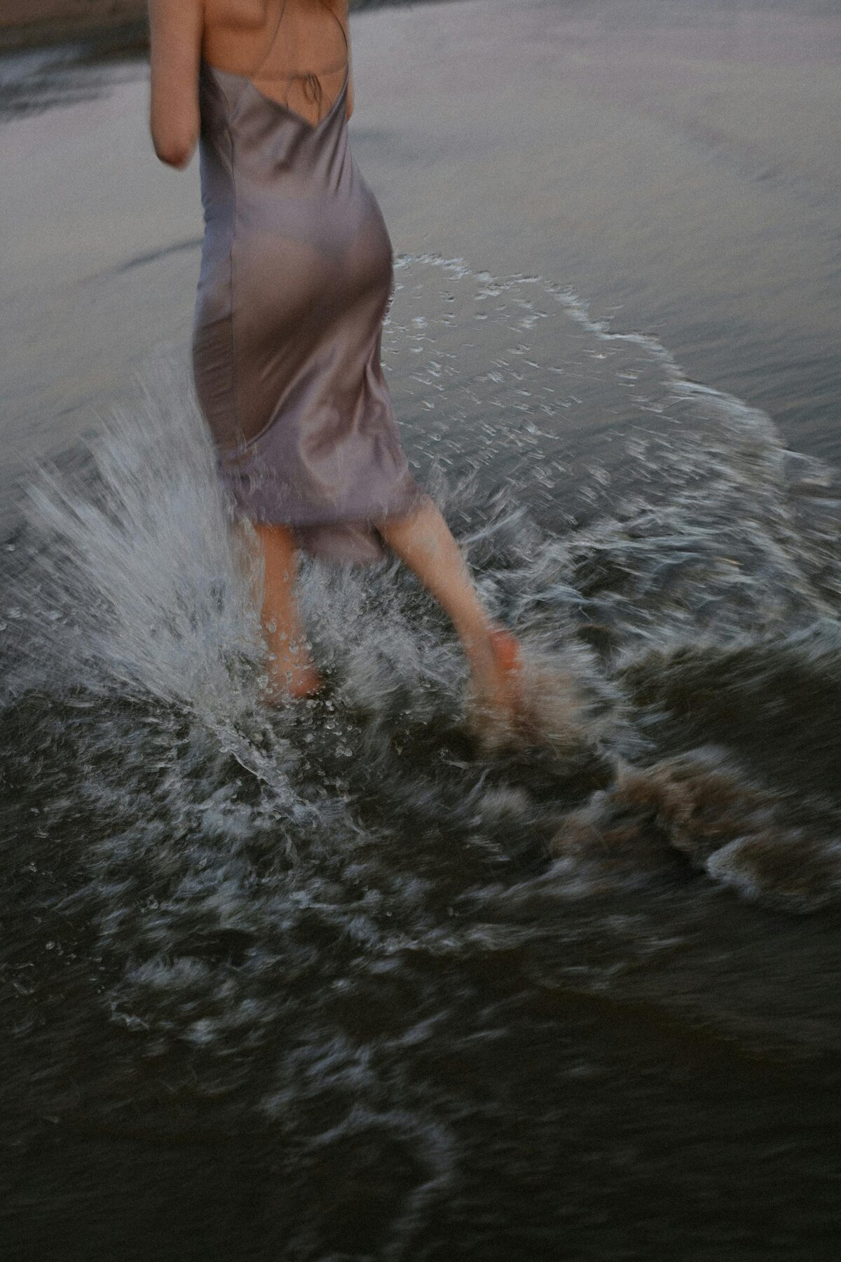 lady-running-in-water