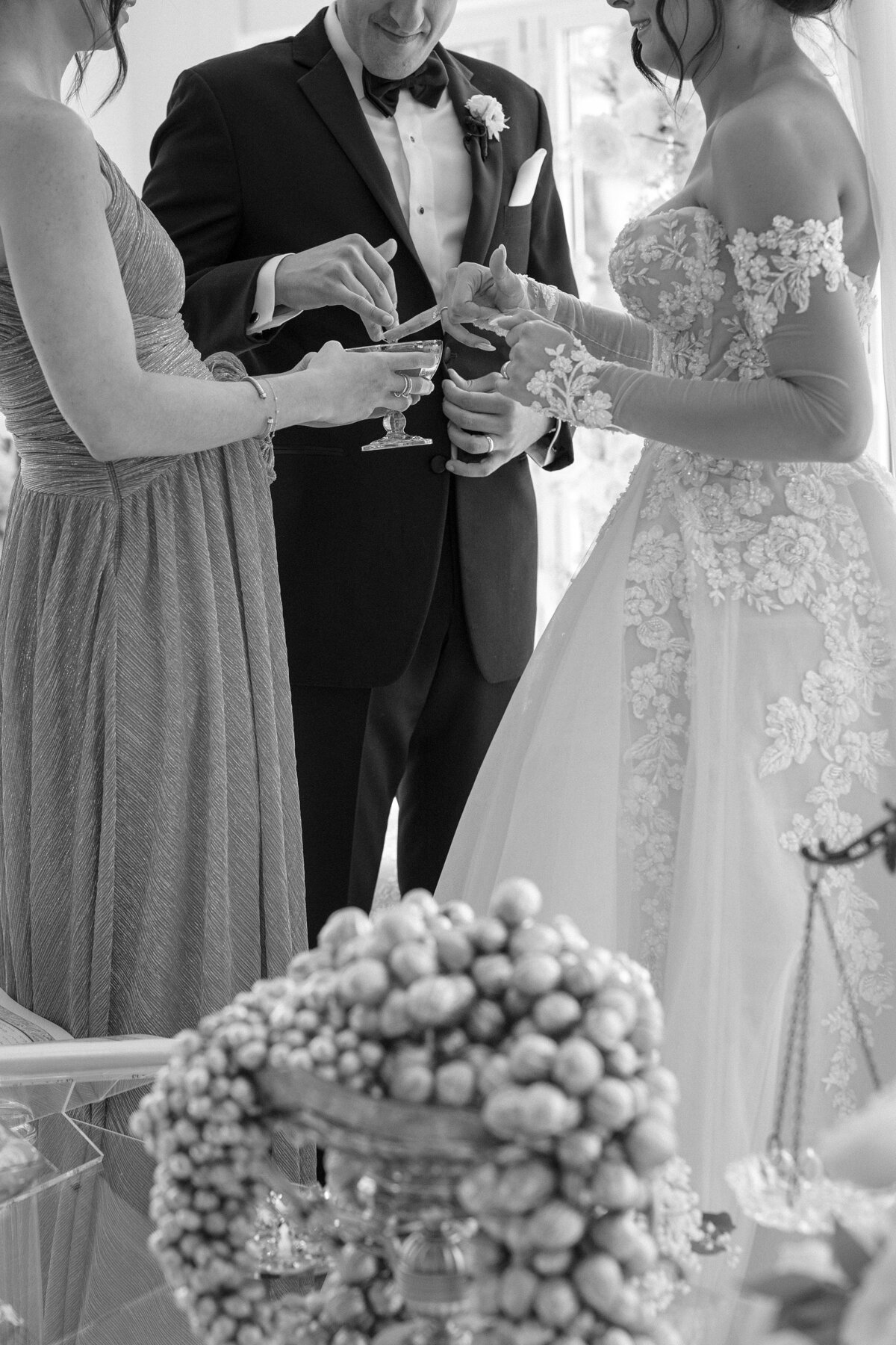Honey ceremony during Persian wedding ceremony at Belle Mer, Newport.
