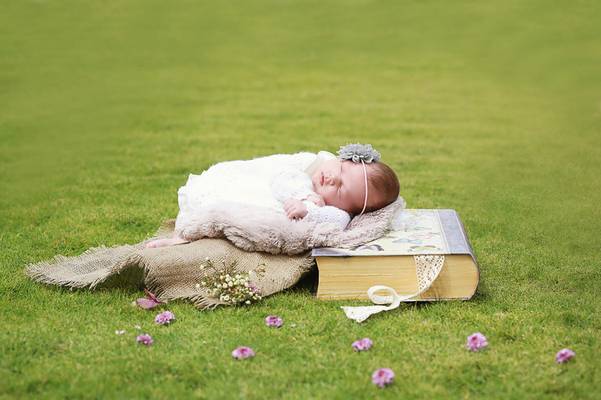 Newborn baby portrait taken outside during at home photo session by Yuliia Terziian Photography in Calgary Alberta.